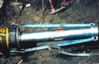 2.2.3. TERRA-Hammer TR 220 mit Rammring, Druckring und Spannvorrichtung, rammt 400 mm Stahlrohr, 18 m lang unter Bahngleis 2.2.3. TERRA-Hammer TR 220 mit Rammring, Druckring und Spannvorrichtung, rammt 400 mm Stahlrohr, 18 m lang unter Bahngleis